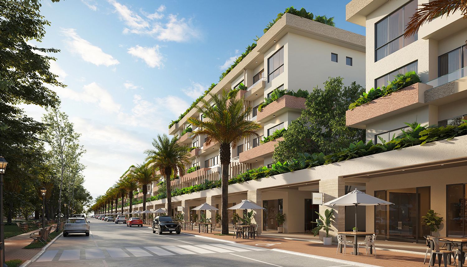 City Place Punta Cana boulevard with shops and apartment buildings